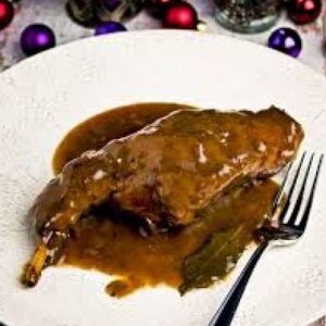 Konijnenbout in saus op limburgse wijze